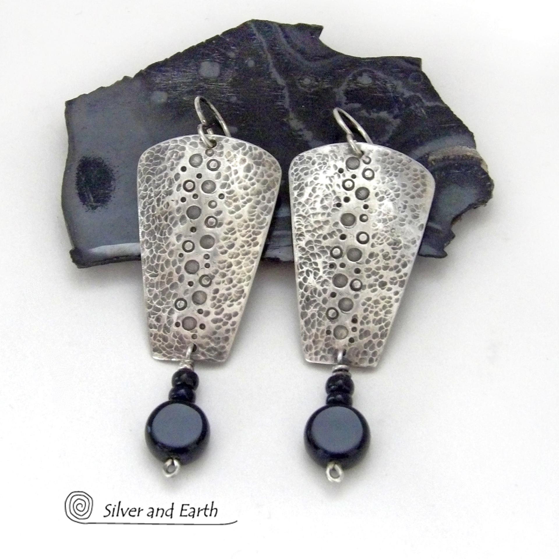 Artisan silver and onyx hot earrings.